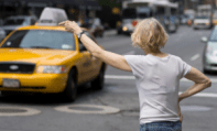 waving for a taxi